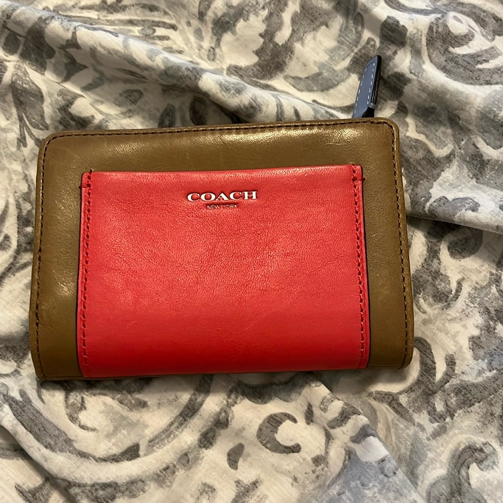 Tan and pink mini Coach Wallet with blue inside